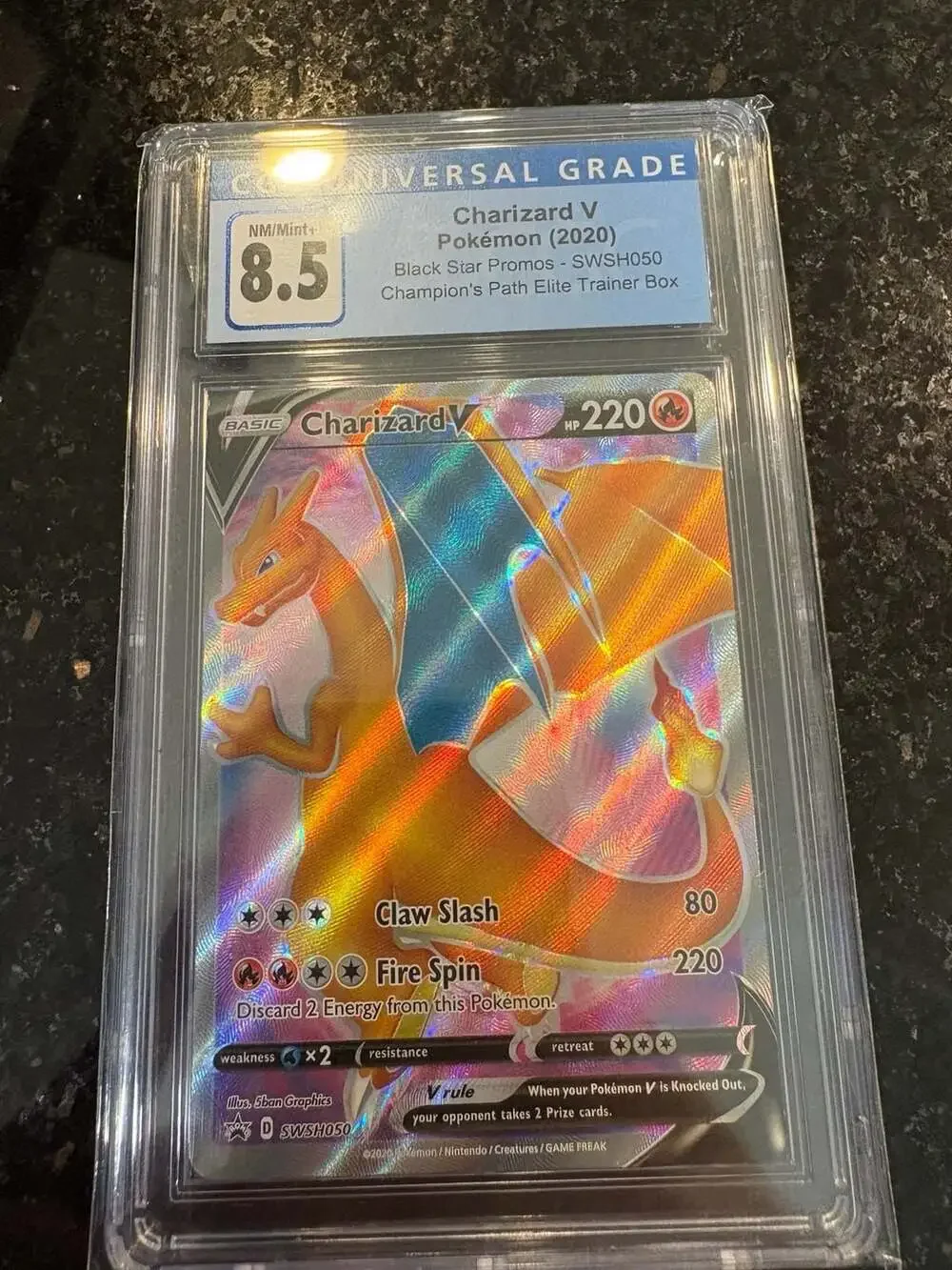 CGC Blue Label 8.5 Charizard V SWSH050 Champion’s Path Black Star Promo